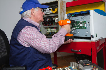 electrician fixing eletrical devices