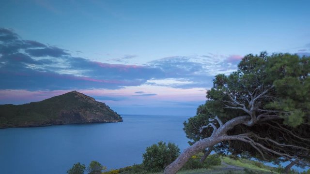 sunset timelapse of the cami de ronda de Roses coastline in catalunya, spain