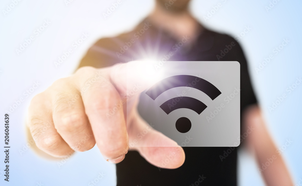 Poster wireless technology concept with businessman touching wifi icon on translucent screen interface