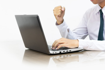 man's hands using laptop on white background