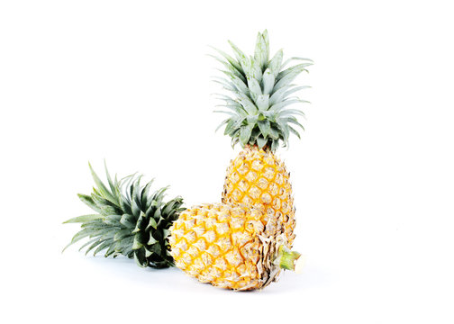 Fresh pineapple fruits on white backgrounds