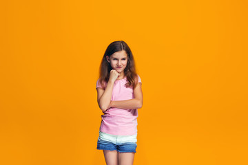 Obraz premium Young serious thoughtful teen girl. Doubt concept.