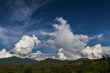Chiang Mai mountain view with amazing cloudy blue sky and rainbow