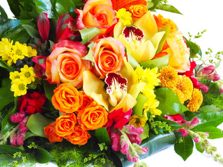 Flower bouquet made of roses, orchids, chrysanthemums, button poms and snapdragon flowers
