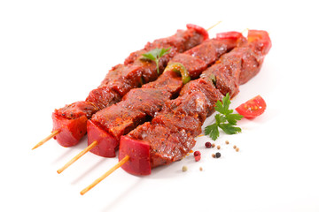 raw skewer on white background
