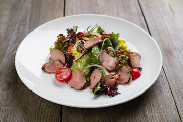 Delicious healthy vegetable and meat salad. Restaurant menu photo, Mediterranean food, appetizer, banquet, dining concept