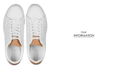White leather male sneakers shoes on laces pattern on white background isolation, top view