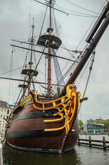 Decorated prow and masts of the sailboat replica moored next to the National Maritime Museum in...