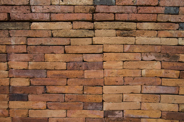 Red old brick wall in the archaeological site.