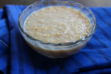 Milk dalia in transparent bowl