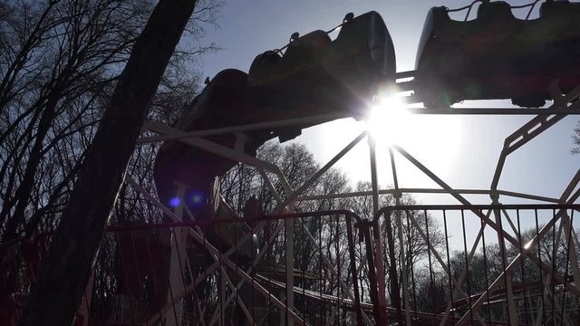 Train attraction for children in a park against blue sky