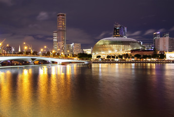 Singapore skyline, night view at Marina Bay with Esplanade theatre.