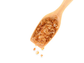 Heap of brown sugar isolated on white,top view