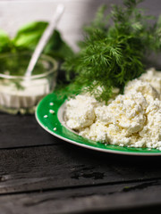 cottage cheese with sour cream and greens (salty cottage cheese)  useful cuisine.  Food background