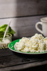cottage cheese with sour cream and greens (salty cottage cheese)  useful cuisine.  Food background
