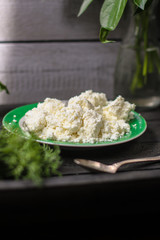 cottage cheese with sour cream and greens (salty cottage cheese)  useful cuisine.  Food background