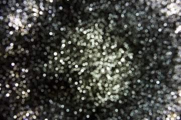 Glitter vintage lights background. Abstract blur background.