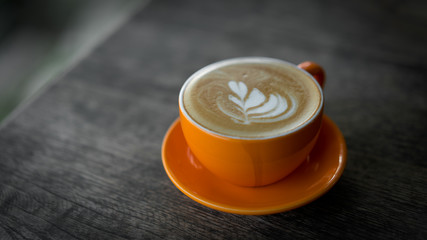 Hot Latte Coffee In Orange Cup