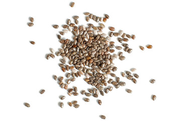 Detail macro closeup photo of spilled chia seeds (Salvia hispanica) isolated on white background...