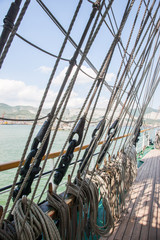 Obraz premium Ropes and Cleats on the Bow of a Wooden Sailboat