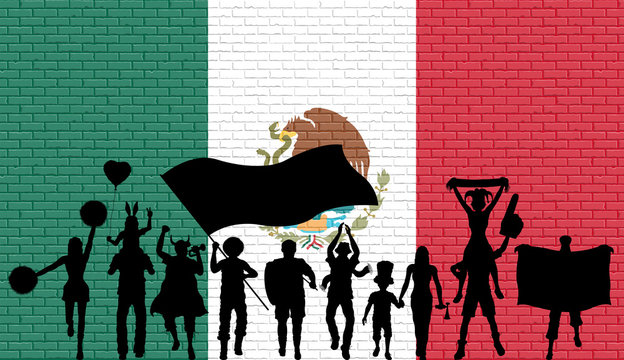 Mexican supporter silhouette in front of brick wall with Mexico flag