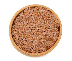 flax seeds in wooden bowl isolated on white background. flaxseed or linseed. Cereals. top view