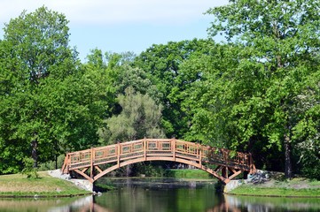 romantic wooden bridge in Clara zetkin park in leipzig, place for wedding photos