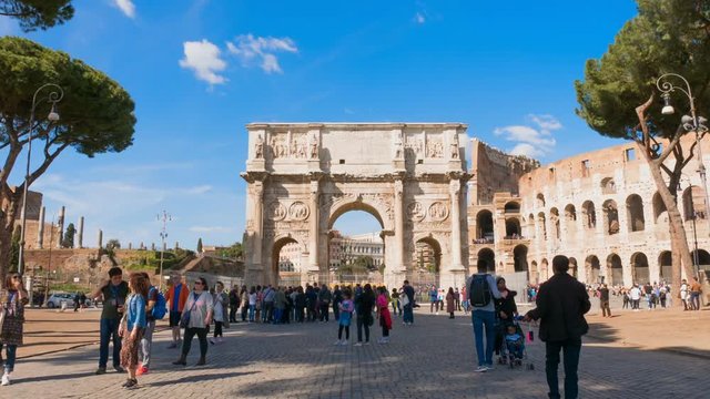 Triumphal Arch of Constantine in Rome front of Colosseum, Most famous places in Time Lapse