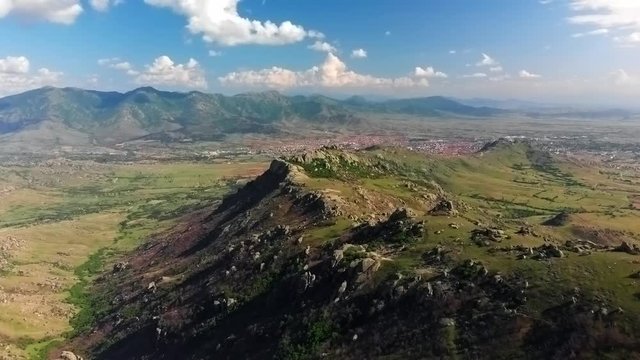 Aerial pushing over rocky mountain ridge in spring. Prilep, Macedonia.