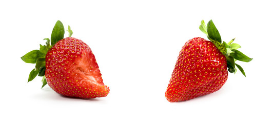 biting strawberry on white background