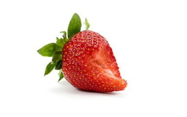 biting strawberry on white background