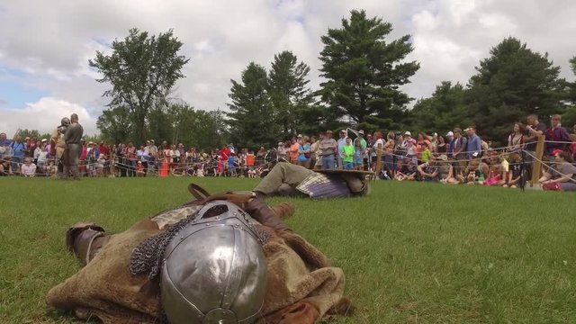 medieval warriors falen in battle slider low of bodies 4k