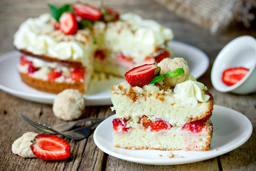 Obraz na płótnie Canvas Fresh strawberry whipped cream biscuit layered cake
