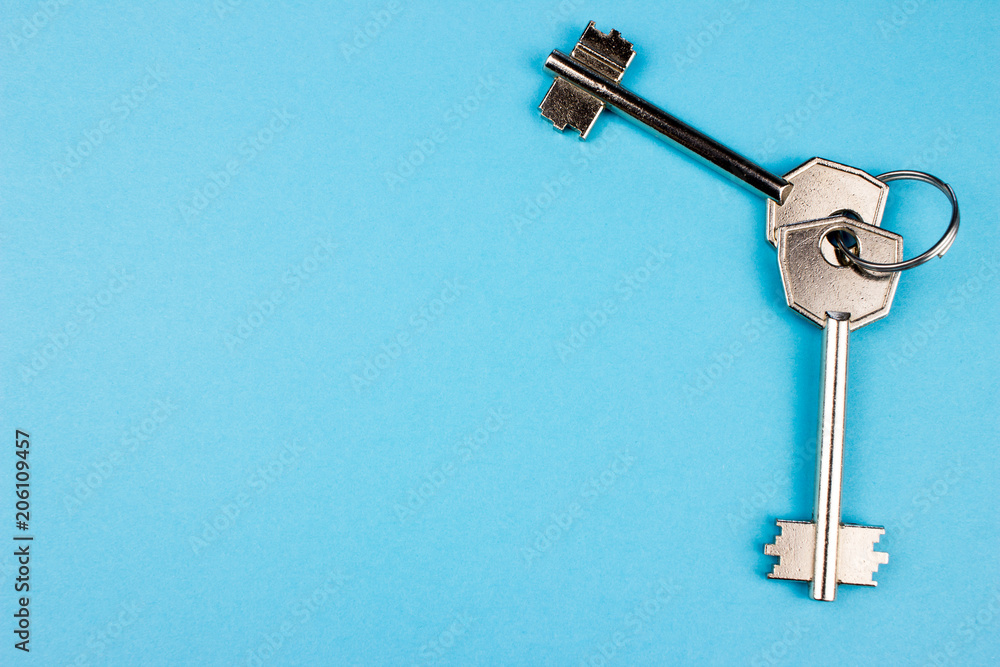 Poster two keys ion blue texture. empty space for text and design