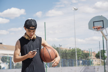Handsome boy Using a Mobile Phone.