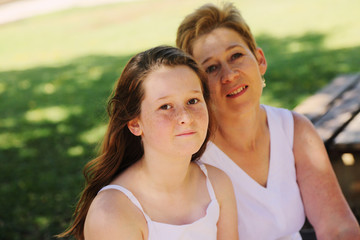 Fototapeta premium Portrait of mother and daughter. Positive human emotions, feelings, joy.