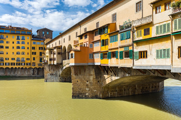 Fototapeta na wymiar Medieval Ponte Vecchio bridge across Arno river in Florence, Italy