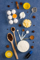Obraz na płótnie Canvas Baking composition eggs flour milk butter spices kitchen tools