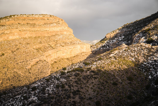 Landscape view near Cloudcroft, New Mexico during sunset with spots of snow. 