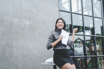 Modern business woman in the office with copy space, smiling business woman. Middle age beautiful and smiling business woman. Selective focus