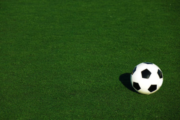 Football on a green field