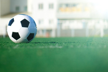 Football on a green field