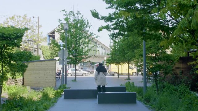 Woman walking to a train station 