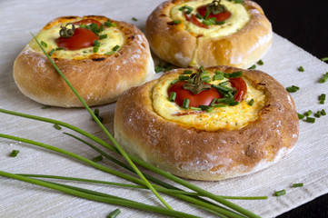 Homemade country cake with cheese and tomatoes.