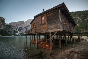 Fototapeta na wymiar photo of Lake Braies (Lago di Braies) in Dolomites Mountains, Italy. Hiking travel and adventure.