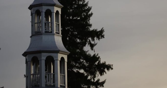 Church at sunset - tilt down steeple