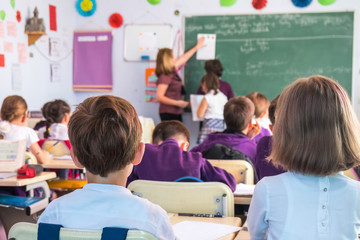 School children are participating actively in class. Lesson