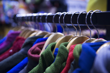 Multi-colored fleece jackets in the outdoor store