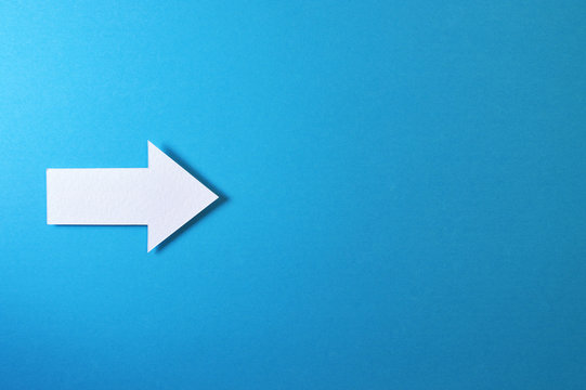one solid arrow on blue background