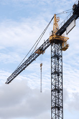 Tower crane against sky.